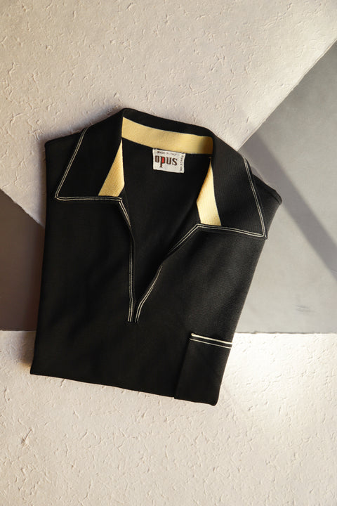 Black fly collar with yellow knit polo (1970)