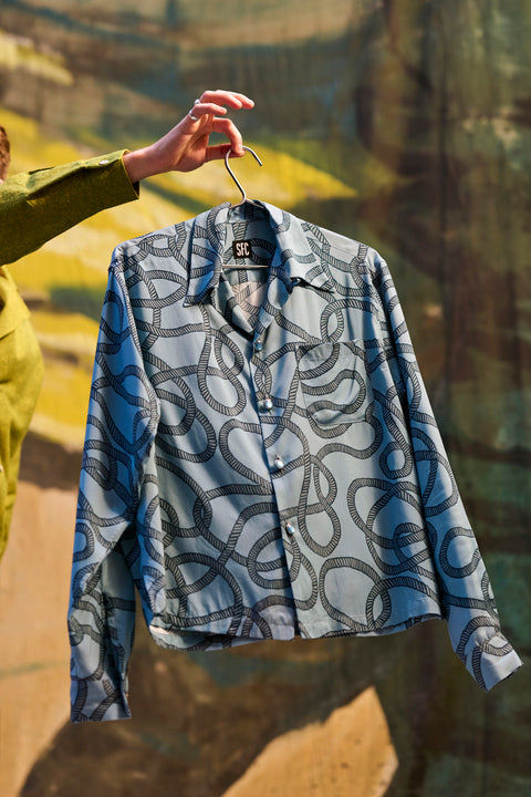 Blue toned drapey rope print shirt