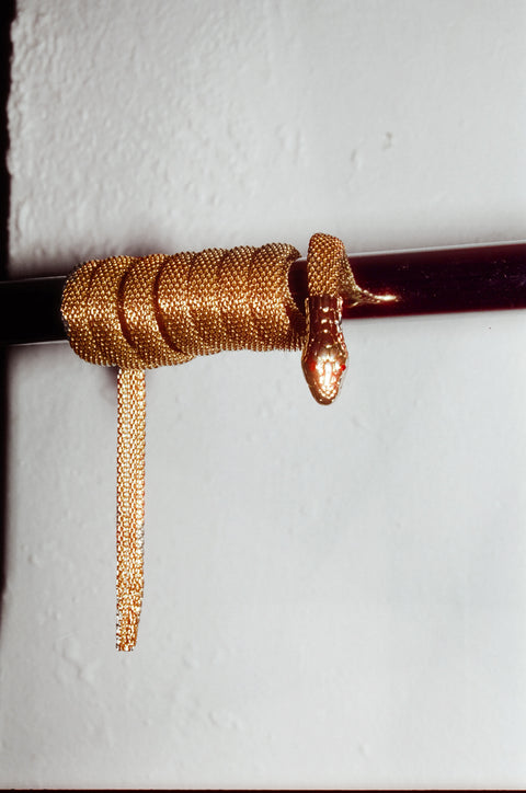 Gold metal chain link snake belt
