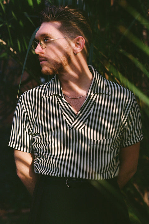 Black and ivory textured stripe beach polo