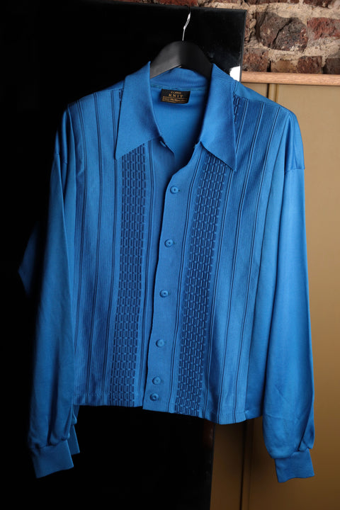 Electric blue textured front knit shirt (1970)