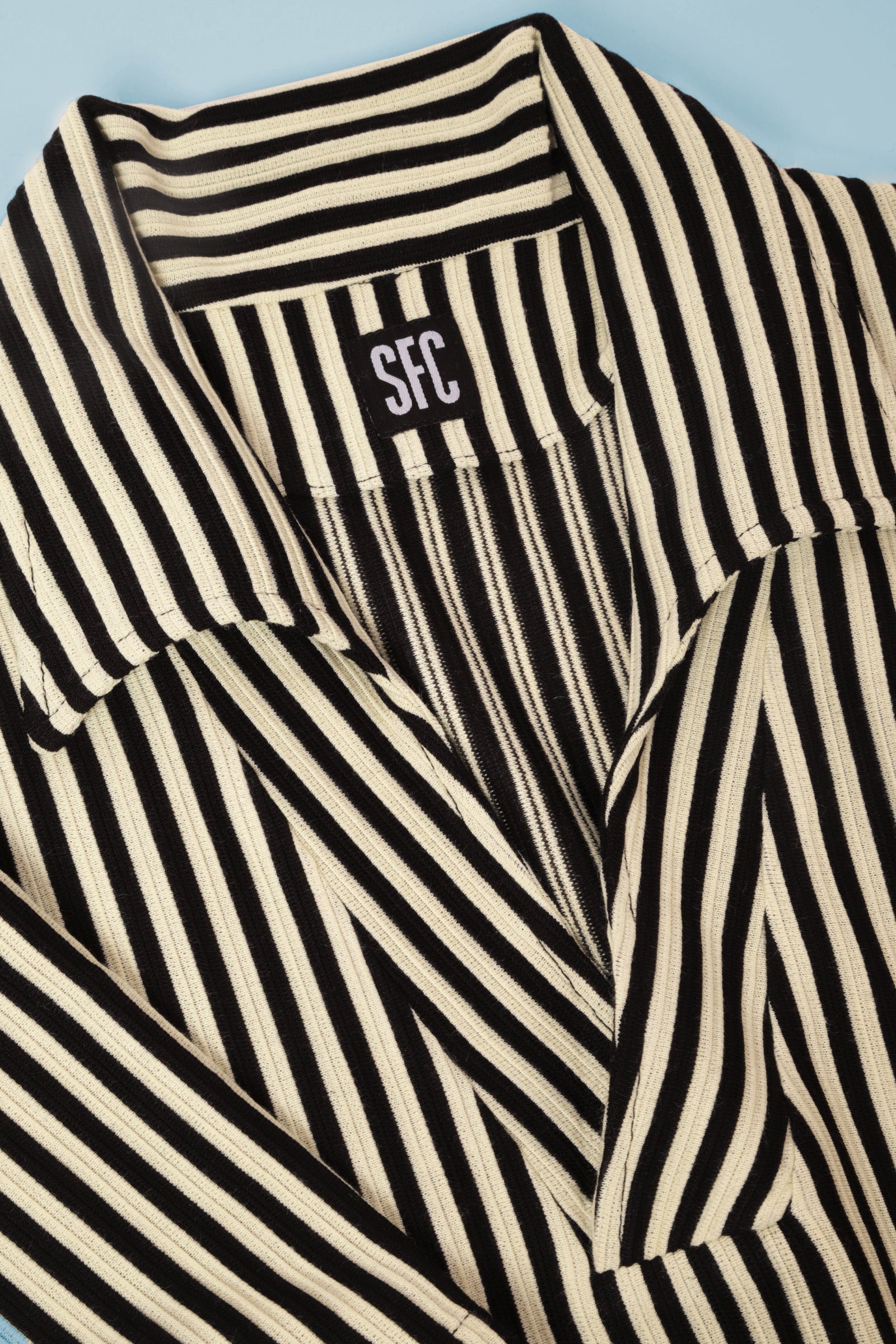 Black and ivory textured stripe beach polo – Scott Fraser Collection