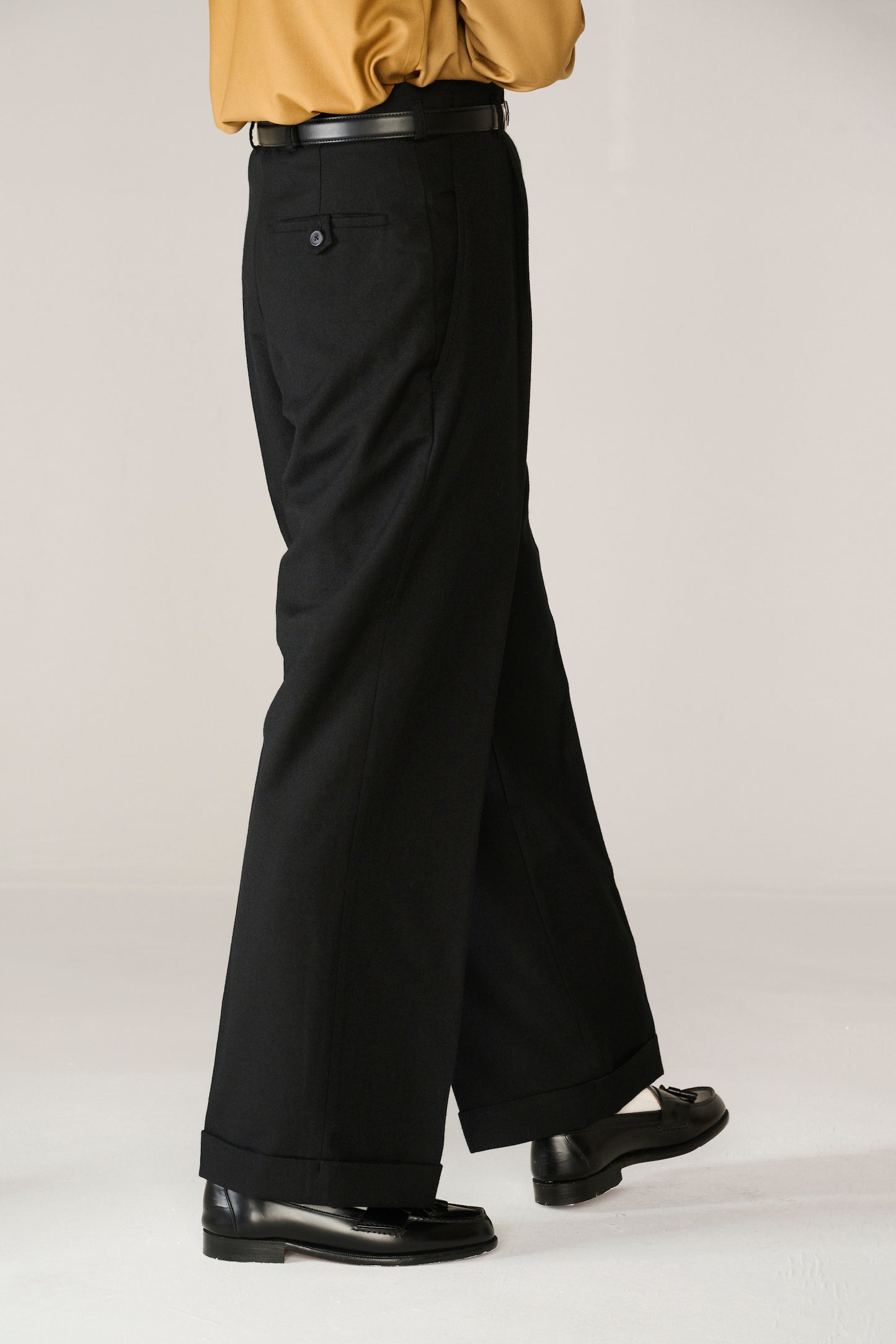 Black wool wide boy trousers